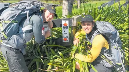  ??  ?? Thomas Hanson (left) and Mitchell Perfect begin their trek along the Te Araroa walkway to raise awareness and funds for suicide prevention.