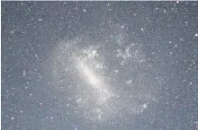  ?? CONTRIBUTE­D ?? The small (shown) and large Magellanic Clouds are galaxies just outside the Milky Way that appear as “smudges” of light in the night sky of Earth’s southern hemisphere.