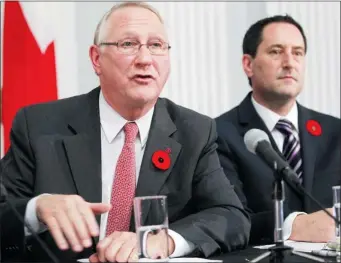  ?? PIERRE OBENDRAUF/ THE GAZETTE ?? Mayor Gérald Tremblay, left, with the chairman of the city executive committee, Michael Applebaum, unveils the 2013 city budget during a news conference on Tuesday.