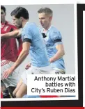  ??  ?? Anthony Martial battles with City’s Ruben Dias