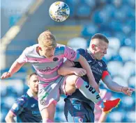  ?? ?? Thistle’s Ben Stanway battles with Scott Brown.