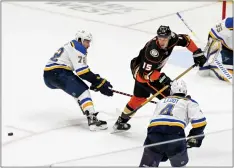  ?? ?? The Ducks’ Ryan Getzlaf (15) passes the puck to Adam Henrique, not pictured, who scores to give Getzlaf the final assist and point of his 17-year NHL career,