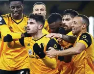  ??  ?? GOLDEN BOY Scorer Neves is the centre of attention