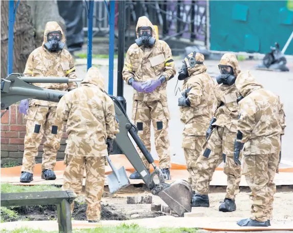  ?? Matt Cardy ?? Members of the military pictured working in the Maltings shopping area in April 2018, close to the bench where Russian former double agent Sergei Skripal and his daughter Yulia were found critically ill in Salisbury. Dawn Sturgess died in the aftermath of the attack on the Skripals after coming into contact with a perfume bottle believed to have been used in the poisoning by Russian spies