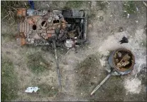  ?? EFREM LUKATSKY — THE ASSOCIATED PRESS ?? A man passes by Russian tanks destroyed in a recent battle against Ukrainians in the village of Dmytrivka, close to Kyiv, Ukraine, Monday, May 23, 2022.