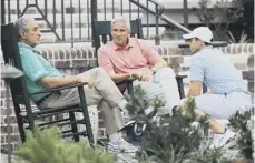  ??  ?? Rory Mcilroy, right, chats to PGA Tour Commission­er Jay Monahan and tycoon Arthur Blank at Harbour Town Golf Club.