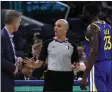  ?? BEN MARGOT — THE ASSOCIATED PRESS ?? Warriors coach Steve Kerr, left, and Draymond Green (23) speak to referee Jacyn Goble after Green was called for a technical foul on Wednesday.