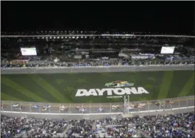  ?? PHELAN M. EBENHACK - THE ASSOCIATED PRESS ?? Drivers take the green flag on the start of the first of two qualifying races for the NASCAR Daytona 500 auto race at Daytona Internatio­nal Speedway Thursday, Feb. 14, 2019, in Daytona Beach, Fla.