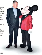  ?? ALBERTO E. RODRIGUEZ/GETTY IMAGES ?? Bob Iger and Mickey Mouse attend Mickey’s 90th Spectacula­r on Oct. 6, 2018, in Los Angeles.