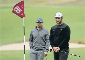  ?? FOTO: AP ?? Entrenando con Rory McIlroy Jon Rahm disputa en Long Island su tercer Open USA