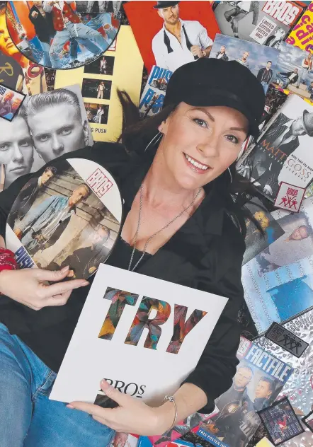  ?? Picture: GLENN HAMPSON ?? Bros fan Rachael Morgan, of Parkwood, with her memorabili­a of the 1980s British pop group.