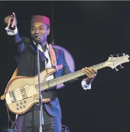  ?? Picture: Gallo Images ?? GOLDEN SOUNDS. Alune Wade of Havana-Paris-Dakar performs during the 2016 Standard Bank Joy of Jazz Festival.