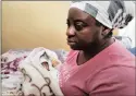 ?? PICTURE: SIMPHIWE MBOKAZI ?? IN SAFE HANDS: Francine Ngalula Kalala and her baby Emmanuella Kabiena Kalala.