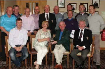  ??  ?? Bridget O’Neill presented her late husband Tony’s Captain’s prize in Wexford Golf Club. Back (from left): Peter Byrne, Pascal Kavanagh, Derek Casey, John O’Neill, DerekWalsh (Vice-Captain), Pat ‘Kenny’Walsh, Seán Flood, Richard Browne, Laurence Carley,...