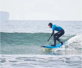  ?? ?? Surfers enjoying lessons from North Coast Watersport­s, Dunnet.