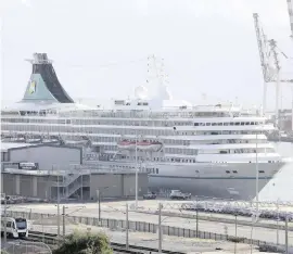  ?? | AAP Image via AP ?? CRUISE liner Artenia docked at Fremantle Harbour in Western Australia on March 27. Twenty-four of Australia’s 61 coronaviru­s deaths have come from cruise ships.