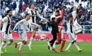  ??  ?? Juventus players celebrate at the end of the win over Samp. Photograph: Alessandro Di Marco/AP