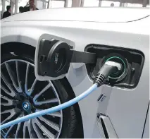  ?? MICHEL EULER/THE ASSOCIATED PRESS FILES ?? The Quebec government has set a goal of having 100,000 electric or hybrid vehicles on provincial roads by 2020. It’s part of a plan to reduce greenhouse gas emissions.