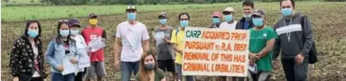  ?? CONTRIBUTE­D PHOTO ?? THE Department of Agrarian Reform in Negros Occidental - North installs 19 agrarian reform beneficiar­ies in a 23-hectare land in Cadiz City earlier this week.