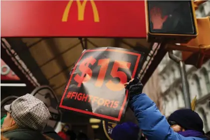  ?? Photograph: Spencer Platt/Getty Images ?? Protesters with NYC Fight for $15 in 2017; the movement has grown over the ensuing years, and activists are ready for the next challenge.