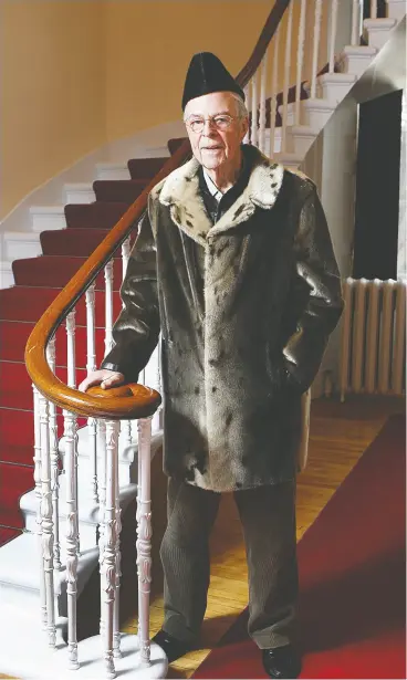  ?? Peter J. Thompson / National Post ?? John Crosbie, then lieutenant-governor of Newfoundla­nd and Labrador, poses for a photo in a seal skin hat and jacket at Government House in St. John’s in 2010.