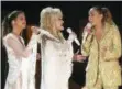  ?? PHOTO BY MATT SAYLES — INVISION — AP ?? Maren Morris, from left, Dolly Parton and Miley Cyrus perform “After The Goldrush” at the 61st annual Grammy Awards on Sunday in Los Angeles.