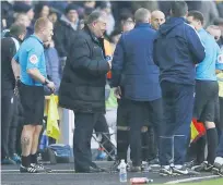  ??  ?? ALL CHANGE Injured referee Tony Harrington is replaced