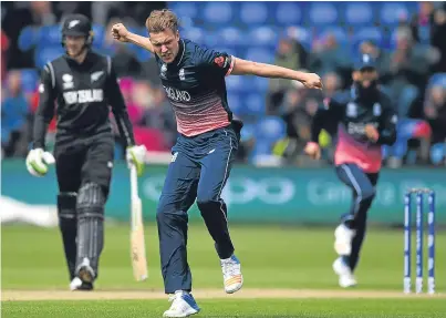  ?? Picture: Getty Images. ?? England bowler Jake Ball celebrates the dismissal of New Zealand opener Luke Ronchi for a golden duck.