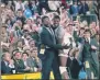  ?? THE ASSOCIATED PRESS ?? FILE - In this April 2, 1984, file photo, Georgetown head coach John Thompson, left, gives a happy pat to the most valuable player Patrick Ewing, after Georgetown defeated Houston 84-75 in Seattle.