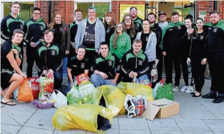  ?? Edge Hill’s men’s and women’s rugby teams who went onto the streets of Liverpool to help the homeless ??