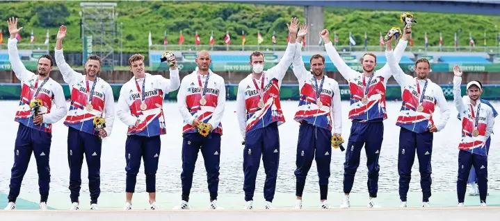  ?? Mike Egerton ?? Great Britain’s men’s eight, including Plymouth’s Jacob Dawson (second from right), receive their bronze medals