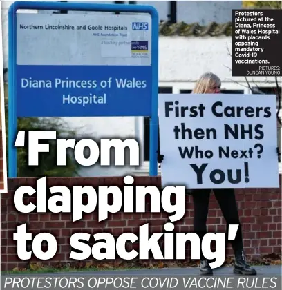  ?? PICTURES: DUNCAN YOUNG ?? Protestors pictured at the Diana, Princess of Wales Hospital with placards opposing mandatory Covid-19 vaccinatio­ns.