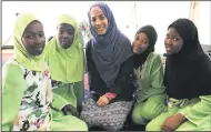  ??  ?? Radia Bawa-Hendricks, centre, with children from a madrasah, will discuss Dhikr (devotional acts in Islam, in which short phrases or prayers are repeated) as a means of self-transforma­tion.