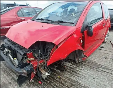  ??  ?? Crushed: The damaged front of Miss Hickling’s Citroen C2 after she left it with the parking firm