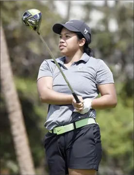  ??  ?? Portland State’s Jasmine Cabajar, a graduate of Maui High School, tees off on No. 13. Cabajar shot a 71, the best score of the day.