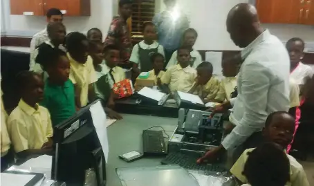  ??  ?? Pupils of some schools during an educationa­l visit to 4Him Technologi­es and Systems Service Centre in Isolo, Lagos as part of activities marking the World Telecommun­ication and Informatio­n Society Day (WTISD) 2017…recently