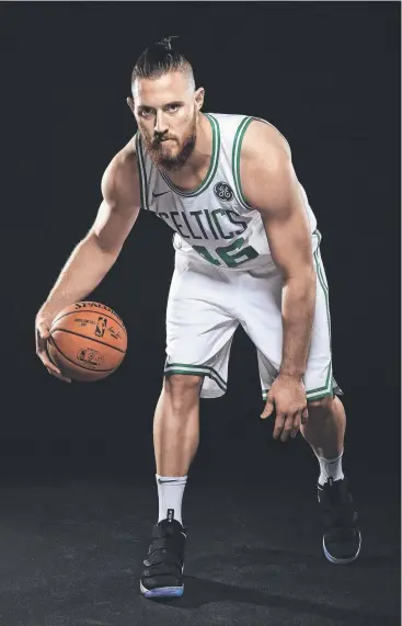  ??  ?? INSPIRATIO­NAL: Aron Baynes is now a key player for the Boston Celtics. Picture: GETTY