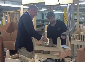  ?? ELIZA COLLINS, USA TODAY ?? Rep. Mark Meadows speaks to a factory worker in Valdese, N.C., during an April 12 tour.