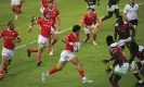  ?? Photograph: Martin Dokoupil/World Rugby/Getty Images ?? Tomas Appleton of Portugal runs with the ball against Kenya.