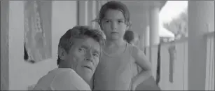  ?? A24 ?? Willem Dafoe, left, the indefatiga­ble moral center of "The Florida Project," and Brooklynn Prince.