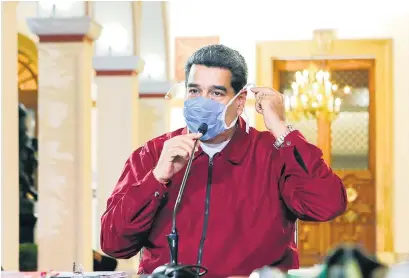  ?? I AFP ?? Maduro en tiempos de coronaviru­s, en el palacio de Miraflores. EE.UU. lo acusa de narcoterro­rista.