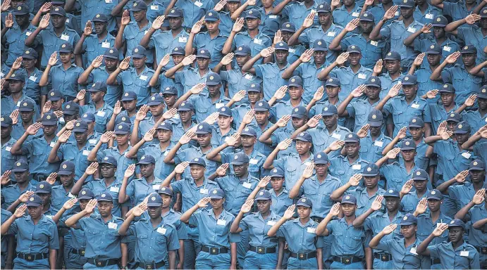  ?? Picture: Jacques Nelles ?? Police officers salute new National Police Commission­er General Khehla John Sitole during his inaugurati­on parade at the Saps training academy yesterday.