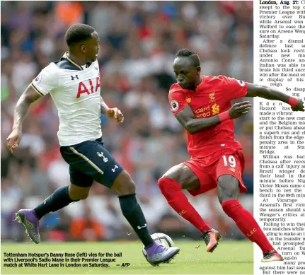  ?? — AFP ?? Tottenham Hotspur’s Danny Rose ( left) vies for the ball with Liverpool’s Sadio Mane in their Premier League match at White Hart Lane in London on Saturday.