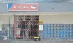  ?? Picture: FAITH QINGA ?? DOORS SHUT: The post office in Port Alfred is temporaril­y closed but mail can be collected at the sorting depot