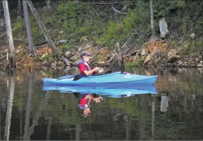  ??  ?? KAYAK ANGLING: Although capable of handling larger crafts, Cedar Creek Lake is a great destinatio­n for kayak