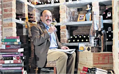  ??  ?? Basset in his cellar at the Hotel Terravina in 2012: despite being born in France he regarded himself as an Englishman, training many leading British sommeliers and challengin­g the profession’s reputation for aloofness