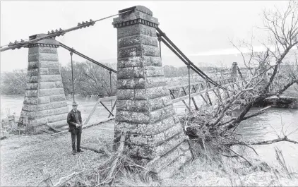  ??  ?? Bridge mystery . . . Further to recent discussion­s in this column about the sad demise of the 1885built Sutton suspension bridge, we have found this black and white photo in the ODT files, which we believe shows the bridge. But the photo is undated...