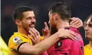  ?? Walton/PA ?? Wolves’ Conor Coady (left) and José Sá celebrate their victory. Photograph: John