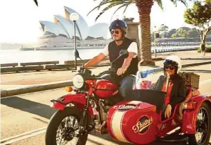  ?? — Shelby’s Sidecar Tours ?? A rider from Shelby’s Sidecar Tours taking a passenger on a spin around Sydney.