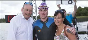  ??  ?? Paul, Evan and Veronica Kelly. Evan came home in third place in the Lough Gill 10k swim.